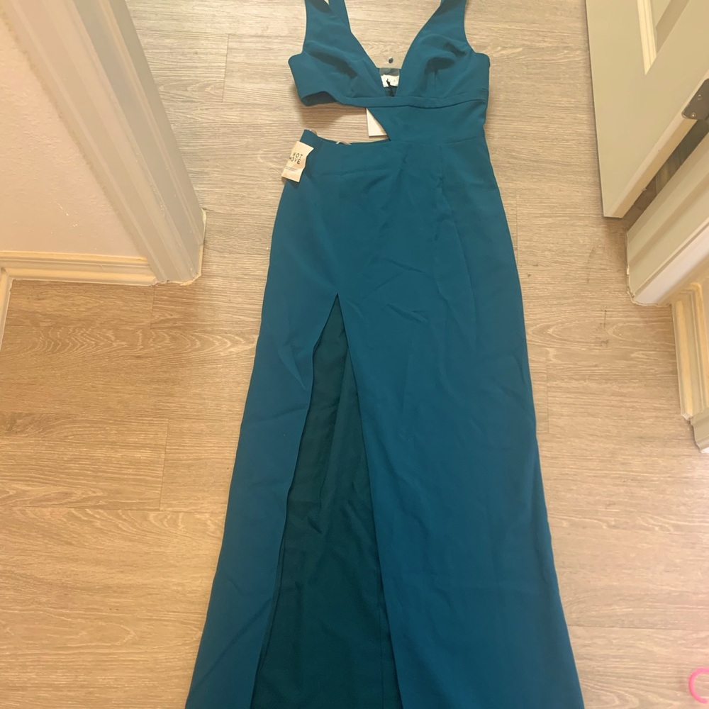 Brand new with tags. Fame and partners teal gown!